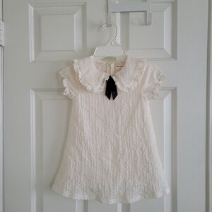 Cozy Pixies White Ruffled Baby Dress with Bow